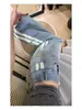 Calça jeans azul claro estilo retrô americano com fita de gorgurão, projetada para mulheres altas, com uma versão alongada, calça pantalona estilosa que afina a silhueta e apresenta um corte curvo