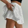 Falda corta de lunares florales de nuevo diseño europeo y americano transfronterizo para Primavera/Verano 2026, con corte ajustado, cintura alta y cintura elástica