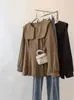 Ropa de mujer talla grande 2026 otoño nueva moda casual abotonada de manga larga suelta entallada a la cintura top camisa