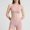 Conjunto de ropa de yoga transfronterizo para verano, con diseño de espalda descubierta calada, top de yoga, shorts de yoga que ciñen la cintura y levantan las caderas