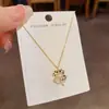 Moda de Nicho Simple Chapado en Diamante Cuadros Flor de Cuatro Hojas Collar Personalidad Femenina Lujo Ligero Versátil Cadena de Clavícula de Gama Alta Venta al por Mayor