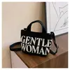 Bolso de Lona Pequeño Estampado Casual para Mujer Bolso de Comercio Exterior Nuevo Moda Transfronteriza Portátil Cubo Mini Bolso de Hombro Cruzado para Mujer