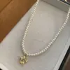 Colar feminino de pérolas de água doce retrô simples europeu e americano, com estrela geométrica de cinco pontas e zircônia incrustada, corrente de clavícula dourada