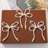 Versión coreana de un sencillo lazo de perlas de cristal, accesorios para el cabello, pendientes y tocados hechos a mano con cuentas, versión coreana, estilo simple.