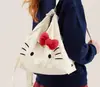 Mochila de Ombro Portátil de Pelúcia Gatinho Hello Kitty Coração de Menina Mochila Fofa de Rua Presente