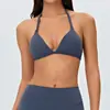 Sujetador de yoga sexy cruzado con cuello halter para mujer con almohadillas extraíbles en el pecho, tirantes ajustables y ropa de fitness