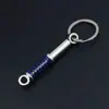 Chaveiro de Modificação de Carro Transfronteiriço Amortecedor Pequeno Presente Chaveiro de Metal Capacete Semáforo Rotor Atacado
