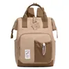 Nova bolsa de maternidade transfronteiriça, bolsa de armazenamento simples multifuncional, grande capacidade, pode ser carregada como bolsa de ombro ou bolsa de mão, mochila feminina moderna