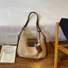 Bolso Estilo Retro Melanoid para Mujer 2026 Otoño/Invierno Nueva Moda Bolso de Hombro Único para el Trabajo Bolso Tote Cruzado Multifuncional