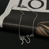 Nuevo Collar con Colgante de Serpiente Enrollada Estilo Frío Sentido del Diseño de Alto Nivel Nicho Creativo Combinación Universal Cierre Cadena de Huesos Distintiva