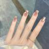 Crema para uñas desgastada a mano Love Caramel Blooming Gold Uñas con acabado ámbar