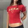 Suéter de cuello redondo con estampado de letras estilo europeo y americano, costuras en contraste, corte ajustado corto con ombligo descubierto, estilo callejero casual