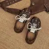 Otoño 2026 Zapatos Casuales Versátiles de Venta Caliente Transpirables Cordones de Dos Colores Zapatos con Estampado de Leopardo Zapatos Retro de Suela Plana Zapatos de Entrenamiento Alemanes para Mujer