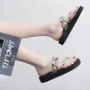 Nuevos zapatos de talla grande para mujer de comercio exterior, sandalias de playa para mujer, ropa exterior para mujer, verano, nuevas chanclas planas Cuihua de punta cruzada, lote