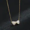 Corrente de clavícula elegante banhada a ouro real com micro cravação de zircônia, design de nicho feminino, colar com pingente de coração, corrente requintada para suéter