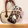 Funda para teléfono móvil Apple 16promax con estampado de leopardo creativo KT Cat iPhone 15, pulsera marrón 14, rígida 13, resistente a caídas