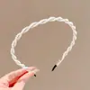 Diadema retorcida fresca y elegante, de lujo ligero para mujer, adecuada para el uso diario en primavera y verano, diadema de ala ancha, dulce accesorio para el cabello estilo coreano