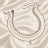 Collar de cuentas multicapa apiladas, estilo punk transfronterizo europeo y americano, dulce y moderno, collar de estrella simple, joyería de perlas de imitación
