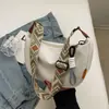 Bolsa Cruzada Nueva Casual Versátil de Nylon Popular Bolso Cruzado Forma de Empanadilla Versátil Nicho Hombro Bolsa para Viajar al Trabajo Venta al por Mayor