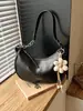 Venta al por mayor transfronteriza de bolsos de axila para mujer de estilo vintage nuevo, bolsos tipo dumpling modernos y elegantes para salir, bolsos de mano, de hombro y cruzados