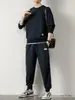 Novo conjunto de moletom em tricô waffle para homens, outono, camiseta de manga comprida cor sólida e calça comprida, esportivo e casual, atacado transfronteiriço