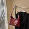 Bolsa de Grande Capacidade Feminina Outono e Inverno Vintage 2025 Novo Design de Nicho Bolsa de Ombro com Corrente Transversal Bolsa de Commuter Bolinho