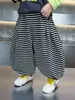 Pantalones casuales a rayas negras y grises para niños de primavera y otoño, pantalones tipo linterna holgados y elegantes estilo coreano para niños, pantalones largos para bebé, comercio exterior