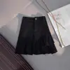 Falda corta 2026 primavera-verano nuevo estilo mezclilla blanca volantes irregulares falda de línea A de cintura alta falda anti-exposición para mujer