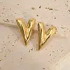 Pendientes Dorados en Forma de Corazón Estilo Europeo y Americano, Pendientes de Botón de Alta Gama para Mujer, Pendientes de Acero Inoxidable de Lujo Ligero, Personalización Profesional de Joyería