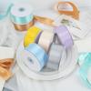 Venta al por mayor de 38 mm de cinta de poliéster de doble cara, cinta para regalo de flores, cinta lisa, cinta de material para regalo DIY