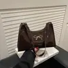 Bolso de Hombro con Lazo Texturizado Estilo Francés, Estilo Nuevo Primavera 2026, Moderno, a la Moda, Sencillo, Elegante y Único, Bolso de Axila