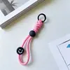 Accesorios de Cuerda Tejida con Cara Sonriente de Dopamina Colgante Estilo Dulce y Fresco Encanto para Bolso de Alto Valor Llavero Modelo Nuevo para Mujeres