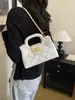 Bolsa de corrente pequena estilo Chanel com trama de losangos feminina nova em couro genuíno moda versátil bolsa de mão bolsa de ombro bolsa de alta qualidade para axila