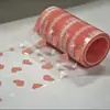 Filme descartável anti-sujeira para viagem, capa de assento de vaso sanitário perfurada portátil de hotel com estampa de coração, filme anti-sujeira à prova d'água atacado