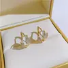 Pendientes de botón de flor de tulipán con pasador de plata 925 para mujer, de alta gama, personalidad, más fáciles de combinar, moda nicho, pendientes de lazo, venta al por mayor