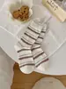 Calcetines de Mujer de Tubo Medio Rayados Simples Versátiles de Moda Estilo Coreano JK Aspecto Adelgazante Elegantes Estilo Universitario Calcetines Caídos