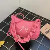 Bolso de Hombro de Diseño de Nicho Estilo Francés Nuevo Modelo 2026 Bolso de Hombro de Color Sólido con Lazo Bolso de Mano Pequeño Simple con Pliegues Venta Caliente