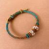 Pulsera de hilo de color Qianli Jiangshan joyería de oro pulsera terminada tejida a mano corona de melocotón producto terminado al por mayor en stock todo-partido