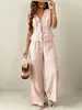 Conjunto de dos piezas estilo resort hecho a medida: Top sin mangas con cuello en V y cintura de corbata combinado con pantalones anchos fluidos