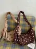 Bolso de lunares de nicho súper popular para mujer, nuevo bolso cruzado de moda 2026, exquisito bolso de hombro para axila, bolso de cuerno