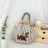 Nuevo bolso de mano portátil estilo japonés y coreano para ir al trabajo en la temporada de floración de los cerezos, bolsa de punto de gran capacidad, bolso tote cuadrado pequeño