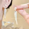Brincos Grandes de Pérola Imitação Camélia 2025 Novo Estilo Quente Brincos de Alto Padrão Estilo Francês para Mulheres