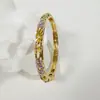 Yongge Jewelry Pulsera de Cloisonné Transfronteriza Pulsera Delgada con Borde Dorado y Esmalte de Goteo Estilo Étnico Versátil Floral Esmalte Joyería Hecha a Mano