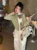 Colete Suéter Feminino Hua Yu Xun 2026 Outono Estilo Coreano Colete de Tricô Texturizado Simples em Camadas Sem Mangas Infantil