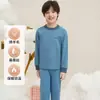 Novo conjunto de roupa íntima térmica infantil outono/inverno, feito com lã e seda, espessado para aquecimento, antibacteriano e design sem costura, adequado para meninos e meninas, para usar em casa e como pijama