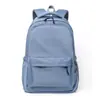 Mochila básica sencilla con múltiples compartimentos para almacenamiento, correas ensanchadas y reductoras de presión, adecuada para la escuela, los desplazamientos diarios y los viajes, ligera y de gran capacidad
