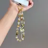 Pulseira de Miçangas Estilo Xiaohongshu com Laço de Flor Delicado, Contas de Borla Versáteis Personalizadas, Corrente de Celular de Alta Qualidade