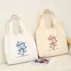 Bolso de lona simple estilo coreano con estampado lindo, bolso tote para estudiantes para la clase, bolso de hombro fresco y simple, versátil