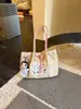 Bolsa feminina de PU transfronteiriça 2026 novo modelo casual kt para o trabalho versátil textura artística estilosa nicho bolsa de ombro tote