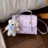 Moda transfronteriza 2026 primavera nuevo bolso de mano, bolso cuadrado pequeño de moda, bolso de hombro versátil y elegante, bolso cruzado para mujer